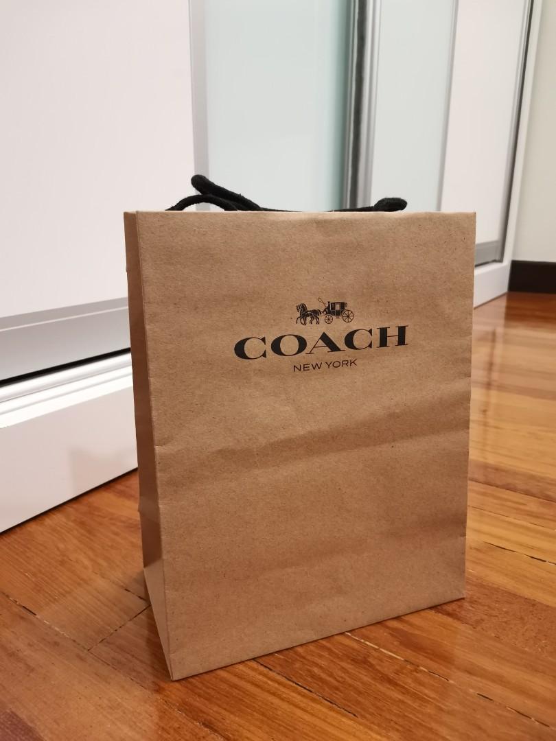 Coach paper shopping bag top