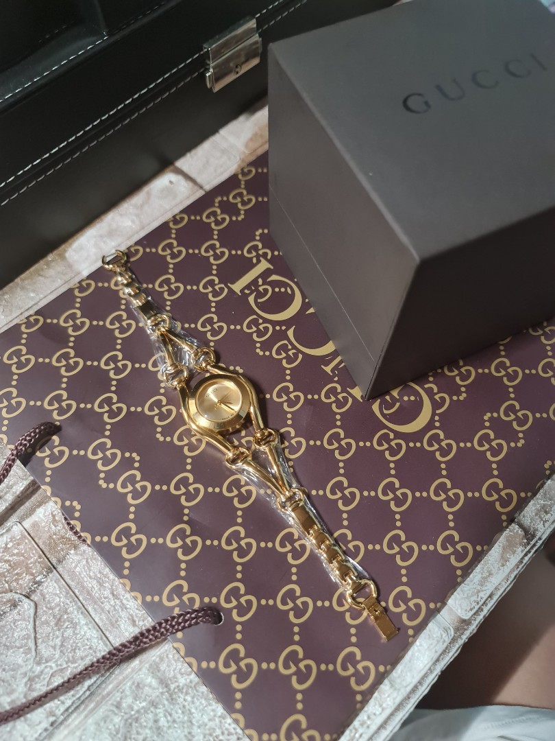 Gucci gold watch small face, Luxury 