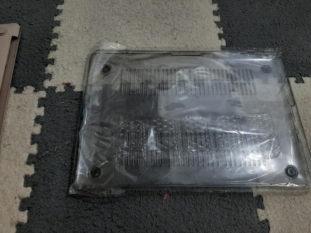 MacBook Pro 2017 case, screen protector and keyboard protector (Category: Laptop Bags & Sleeves) located in Mandaluyong City. Submitted by kinergy04 (Listing ID 1159181589, Image 3). Description: Selling my preloved cases and accessories. Includes 2 cases, silicon keyboard protector and screen protector. Will try to find other accessories and will include it. Clear case is well used while the beige one is almost new..