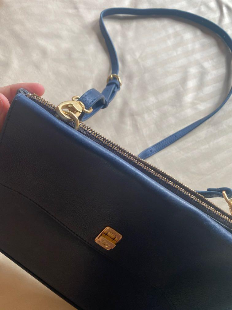 Salad two-tone navy blue black sling bag (Category: Cross-body Bags) located in Quezon City. Submitted by kas1539 (Listing ID 1159083905, Image 2). Description: Good quality leather Bought in HK Guaranteed authentic.