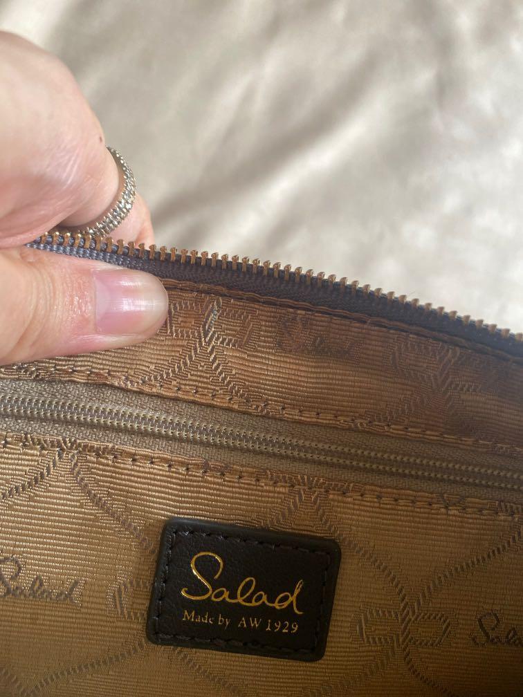 Salad two-tone navy blue black sling bag (Category: Cross-body Bags) located in Quezon City. Submitted by kas1539 (Listing ID 1159083905, Image 3). Description: Good quality leather Bought in HK Guaranteed authentic.