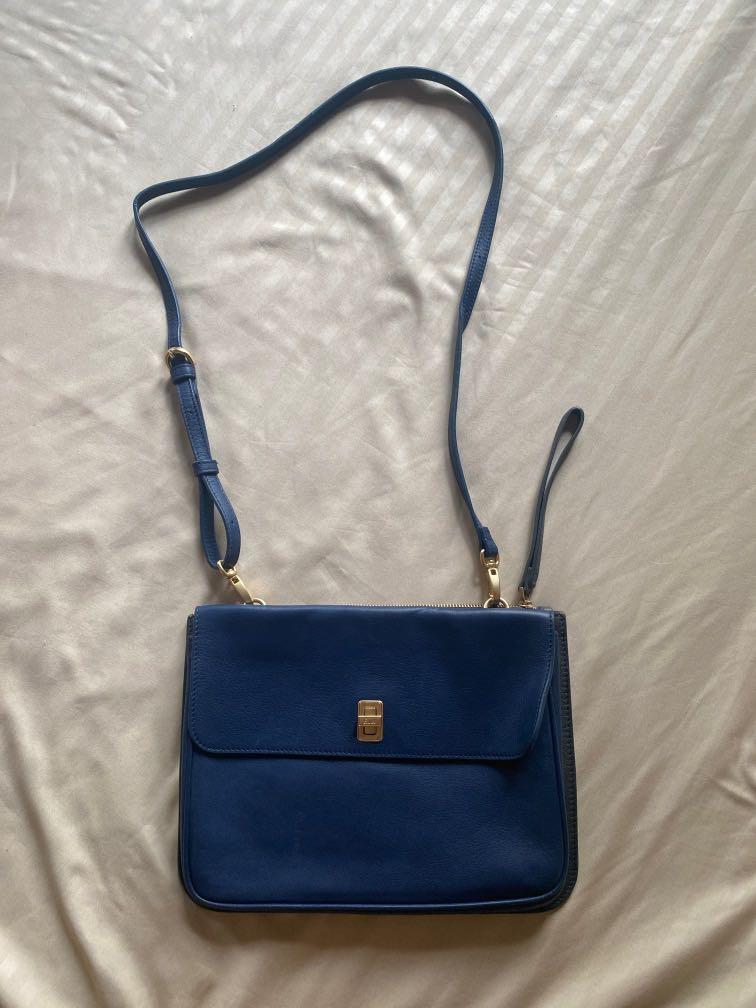Salad two-tone navy blue black sling bag (Category: Cross-body Bags) located in Quezon City. Submitted by kas1539 (Listing ID 1159083905, Image 1). Description: Good quality leather Bought in HK Guaranteed authentic.