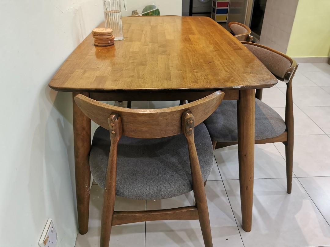 Dining Table (Category: Tables & Sets) located in Singapore. Submitted by prk07 (Listing ID 1159302407, Image 3). Description: Wooden dining table with 5 chairs..heavily used but still strong!! Dimension : 140(L) X 80(W) X 70(H) Arrange for own delivery.. Location: Yew Tee(682683).