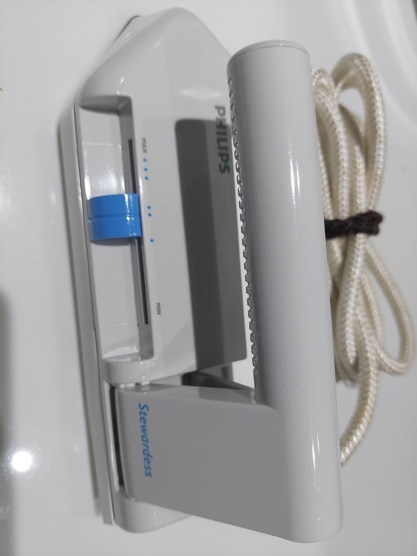 Philips Stewardess Travel Iron (Category: Ironing Boards) located in Makati City. Submitted by akusi (Listing ID 1159259100, Image 2). Description: Almost new Philips Stewardess Travel Iron Used twice only on delicate clothes Very handy, foldable handle, almost new. See photos to appreciate. 220v..