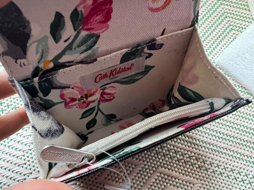 Authentic Cath Kidston Raccoon Compact Wallet (Category: Wallets & Card holders) located in Iloilo. Submitted by chringgg (Listing ID 1159399585, Image 3). Description: selling my brand new with tag cath kidston wallet. •price slightly negotiable •inclusions: paper bag and a generic dustbag it came with •store bought — 100% authentic •srp: 3000 rfs: decluttering .