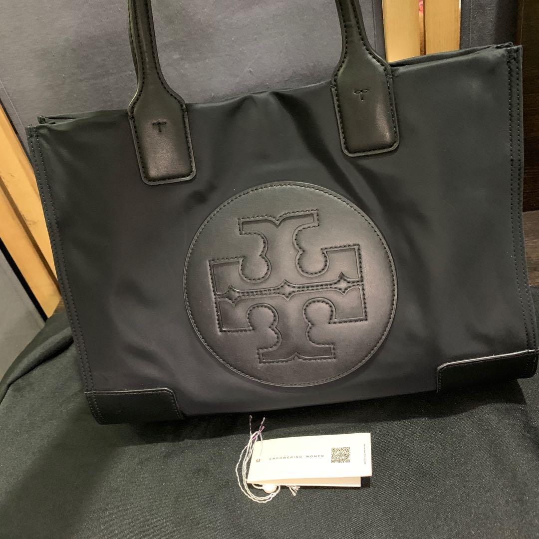 Torry Burch womens Ella Nylon (Category: Luxury Bags & Wallets) located in Makati City. Submitted by teacher_marley (Listing ID 1159506319, Image 2). Description: Ella Nylon Top Hand Bag Tote Bag with a logo patch Gusset snap closure PU leather top handle 1 interior zipper pocket Holds an 13” laptop Height: 13.2 ” (33 cm); length: 17.3” (43.5 cm); depth: 5.2” 💯 Legit .