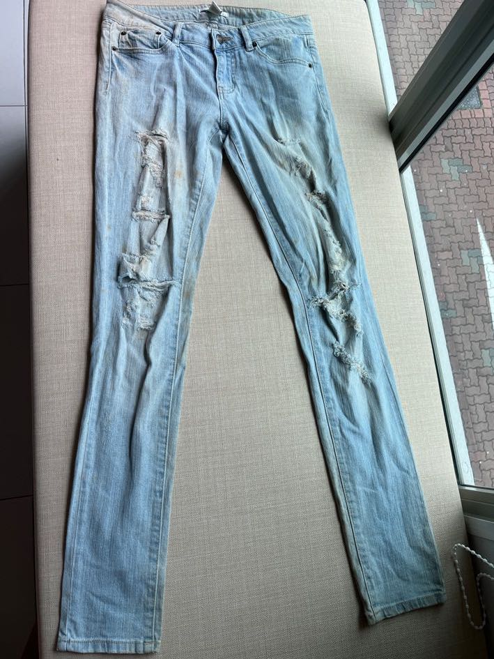 blue jeans , drawstring grey pants 