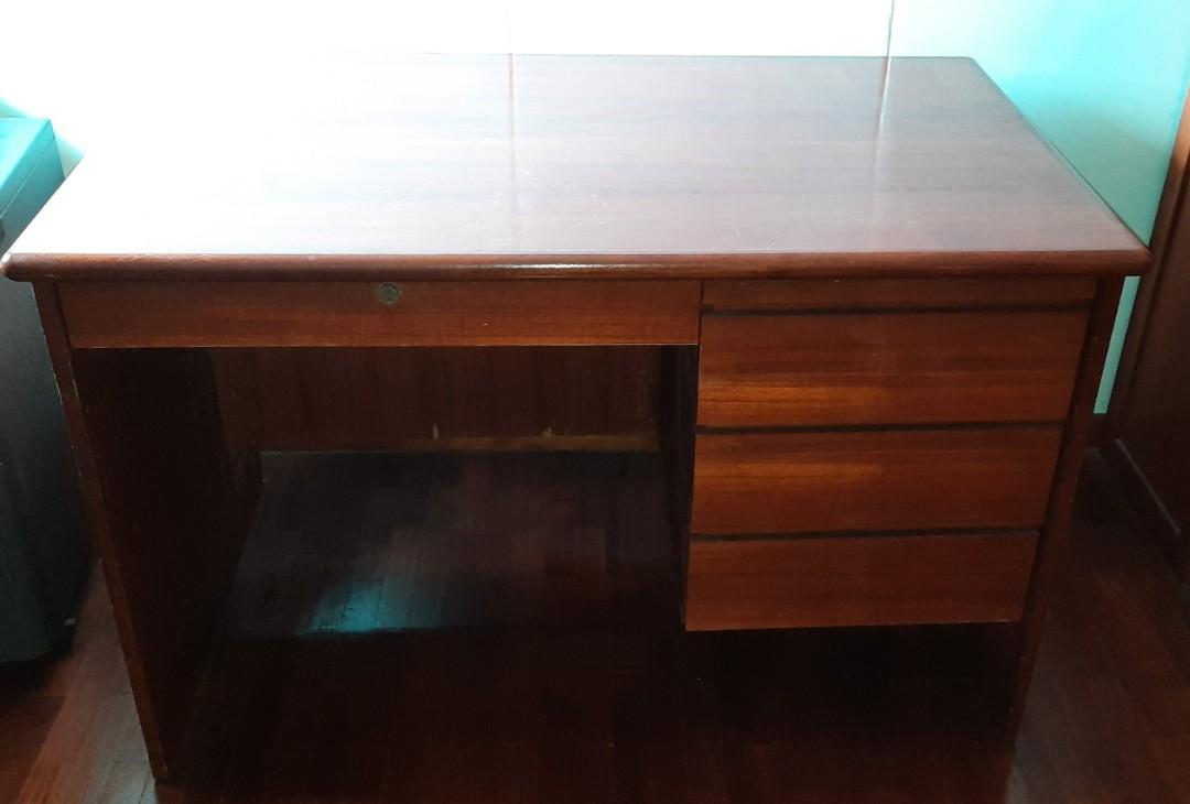 Study table (Category: Tables & Sets) located in Singapore. Submitted by erictham0927 (Listing ID 1159438977, Image 2). Description: old study table. drawers all in gd working condition. no scratches. L 120 H 77 W 73 cm. Arrange your transport.