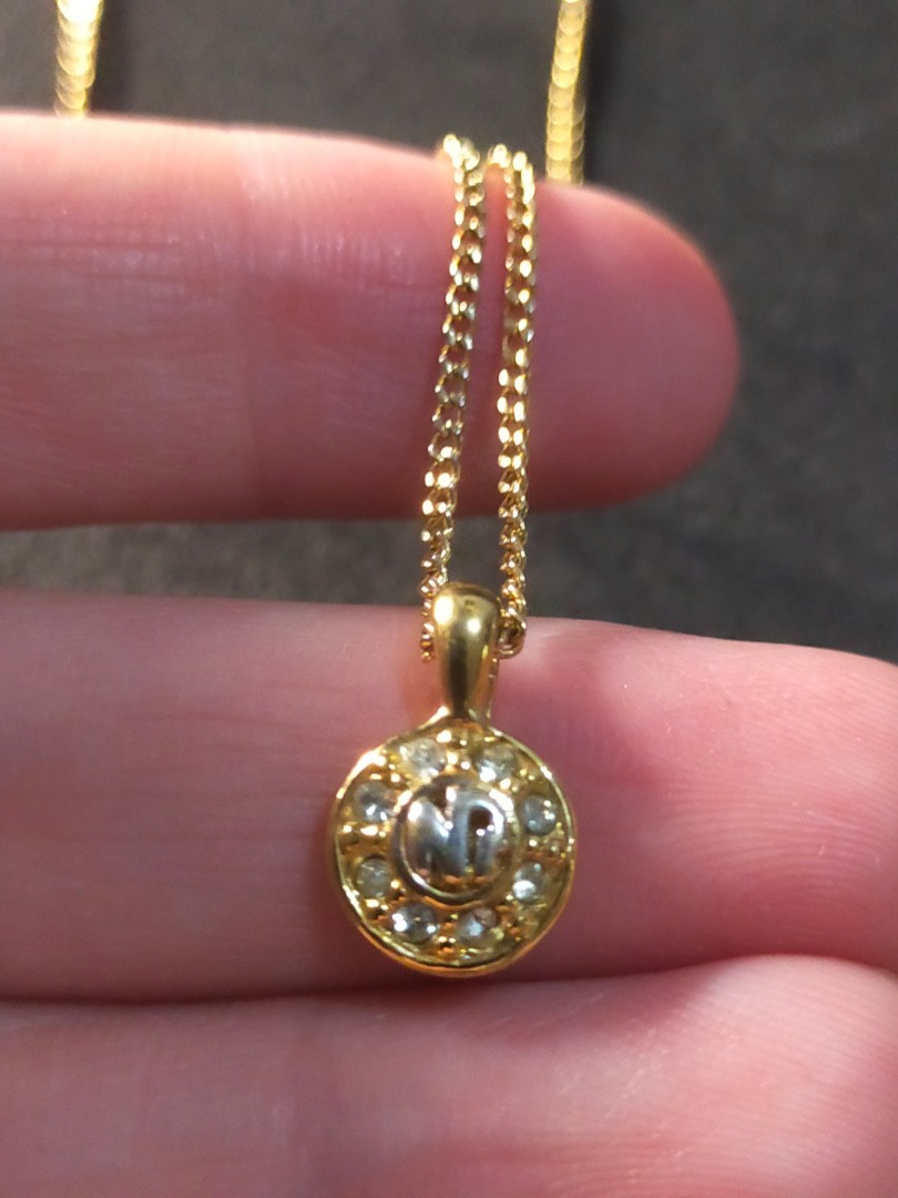 Nina ricci necklace gold price top
