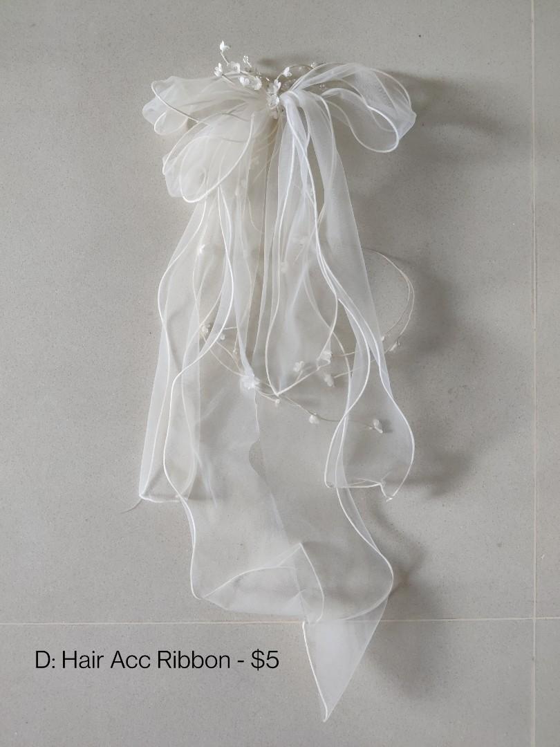Wedding Essentials (Category: Occasions & Party Supplies) located in Singapore. Submitted by candycanes (Listing ID 1159638449, Image 2). Description: Items for sale have only been used during wedding day! 1. Red Cloth for hanging at door: $8 2. Bride Robe XL: $4 3. Hair Acc Ribbon: $5 Meetup: Bukit Timah/Bukit Panjang area Delivery: Add $3.20 for Speedpost registered mail.