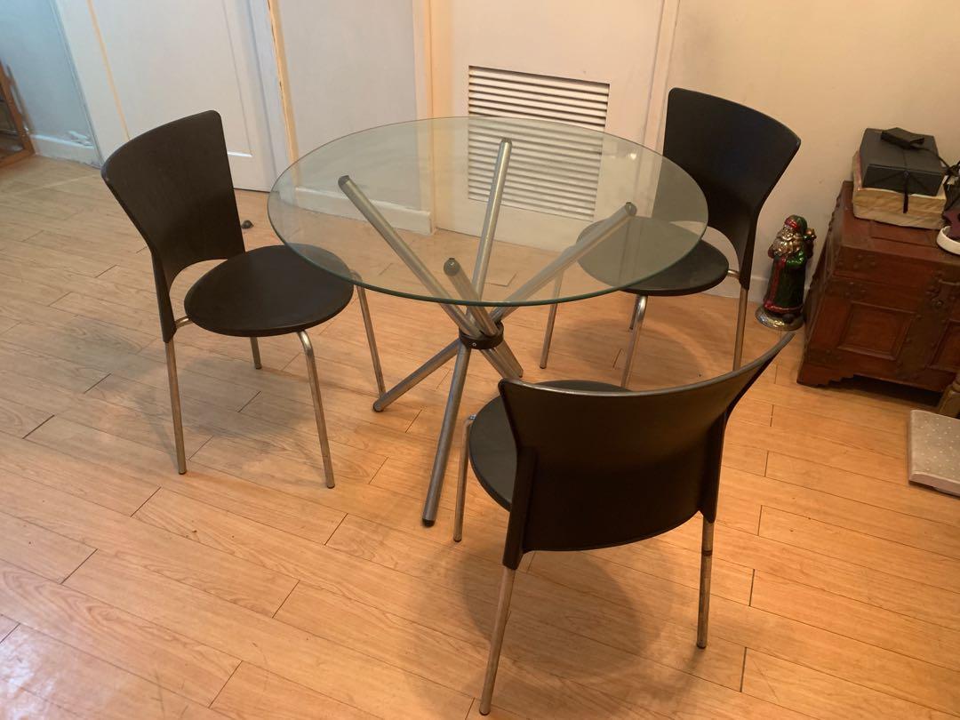 3-seater glass dining table set (Category: Tables & Sets) located in Quezon City. Submitted by pgv18 (Listing ID 1164049702, Image 2). Description: Dining set - Glass table (no cracks) - 3 pcs plastic chair with steel legs Well used but still very nice Shipping via lalamove or buyer pickup Buyer shoulders shipping 📍Eastwood, QC.