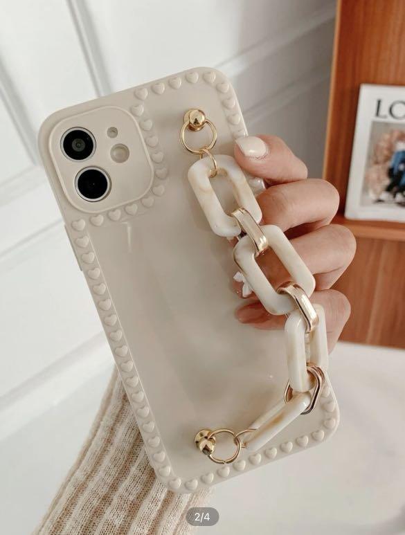 Shein Beige iPhone 13 Case with Hand Strap Chain (Category: Cases & Sleeves) located in Taguig. Submitted by heytreasure (Listing ID 1163914522, Image 2). Description: Cellphone case from Shein. Beige, elegant and convenient to carry because of the marble-print and gold hand chain. Material is like soft silicon type. First 3 photos are from the internet; the rest are actual product photos. 💵 Gcash 📍 Taguig .
