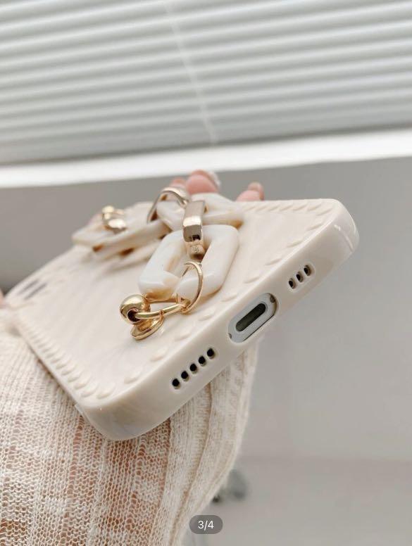 Shein Beige iPhone 13 Case with Hand Strap Chain (Category: Cases & Sleeves) located in Taguig. Submitted by heytreasure (Listing ID 1163914522, Image 3). Description: Cellphone case from Shein. Beige, elegant and convenient to carry because of the marble-print and gold hand chain. Material is like soft silicon type. First 3 photos are from the internet; the rest are actual product photos. 💵 Gcash 📍 Taguig .