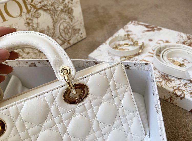 Lady D joy bag white lambskin preorder (Category: Luxury Bags & Wallets) located in Mandaluyong City. Submitted by japanandsingaporeluxepreloved (Listing ID 1163891219, Image 2). Description: Diclaimer: we are not associated with the brands that are linked and stated with this post. All copyrights are reserved to its brandowners . No infringement intended . The Lady D-Joy bag captures the House’s vision of elegance and beauty. Refined and sleek, 