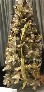 Small golden Christmas tree and decors