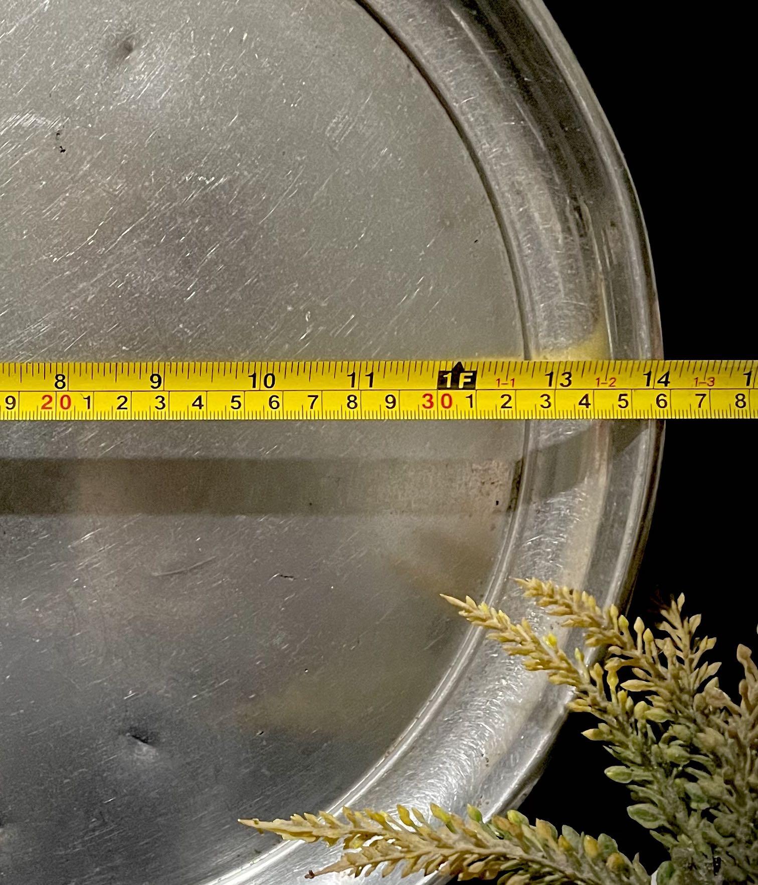stainless serving tray; 14 inch diameter (Category: Other Kitchenware & Tableware) located in Quezon City. Submitted by lanqcqc (Listing ID 1164005574, Image 2). Description: some dents & scratches/good condition japan surplus; manage your expectations/ please wag maselan 1 to 2 days reservation only❗️ MOP: gcash (pls. add 1% in sending thru kiosk - convenience fee) MOD: lala/grab/gogo express LBC-COP (mostly weekends) SF c/o BUYER ❌COD ❌meet up 