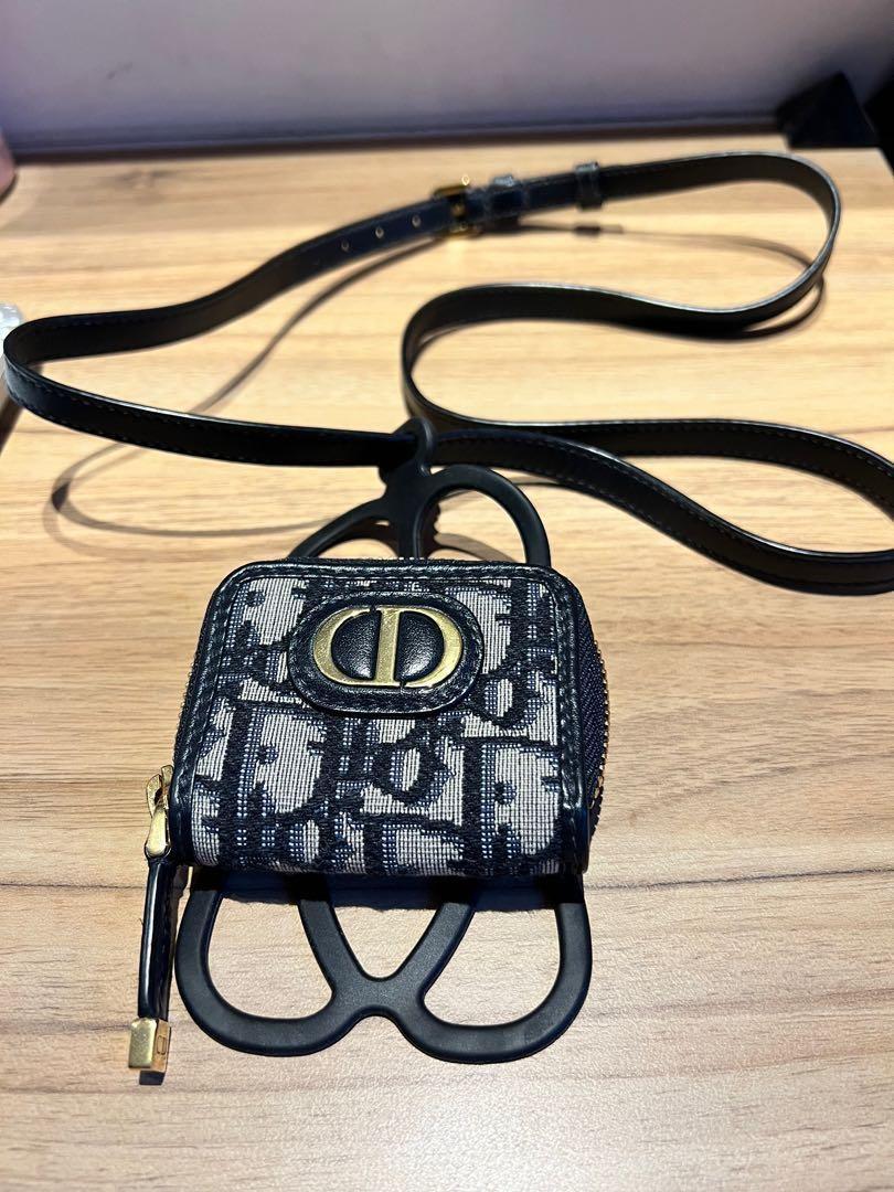 Authentic Dior Handphone Holder with Airpod Case (Category: Luxury Bags & Wallets) located in Quezon City. Submitted by breakmyfashion (Listing ID 1165711483, Image 1). Description: Comes with box. Misplaced receipt. Bought at Dior boutique. Fits all handphone type and come with a small case to keep airpod. Keep your handphone safe and protected! .