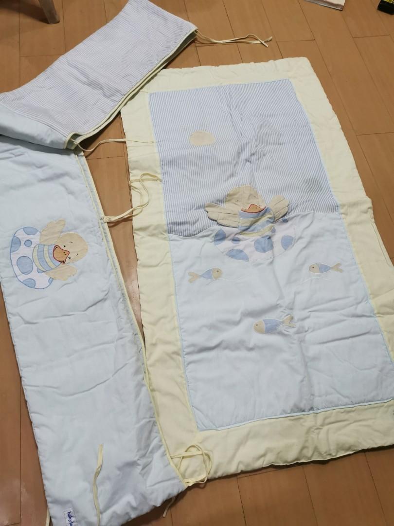 bed guard set (Category: Cots & Cribs) located in Quezon City. Submitted by majasaw88 (Listing ID 1165726785, Image 1). Description: it sold as set with crib side cover and the baby matress. pls see picture for reference. bed side Size- 13feet matress cover- around 50in x27. 5 in.