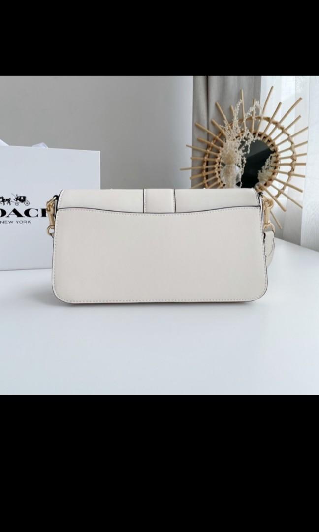 White bag coach top