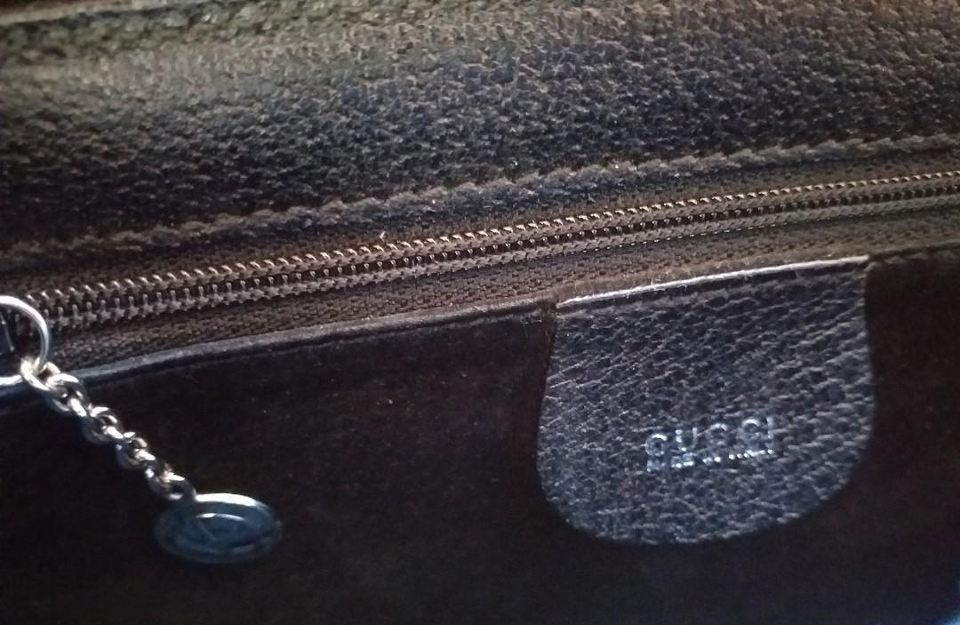 GUCCI Vintage Bag (Category: Luxury Bags & Wallets) located in Pasig City. Submitted by practicalpurchases (Listing ID 1165712417, Image 3). Description: GUCCI black leather bag 6 Actual photos! Decent condition. Last 4 pics were grabbed online, white counterpart for almost $500..