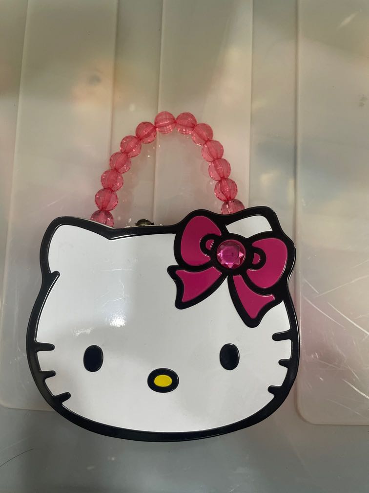 Hello kitty tin best sale purse