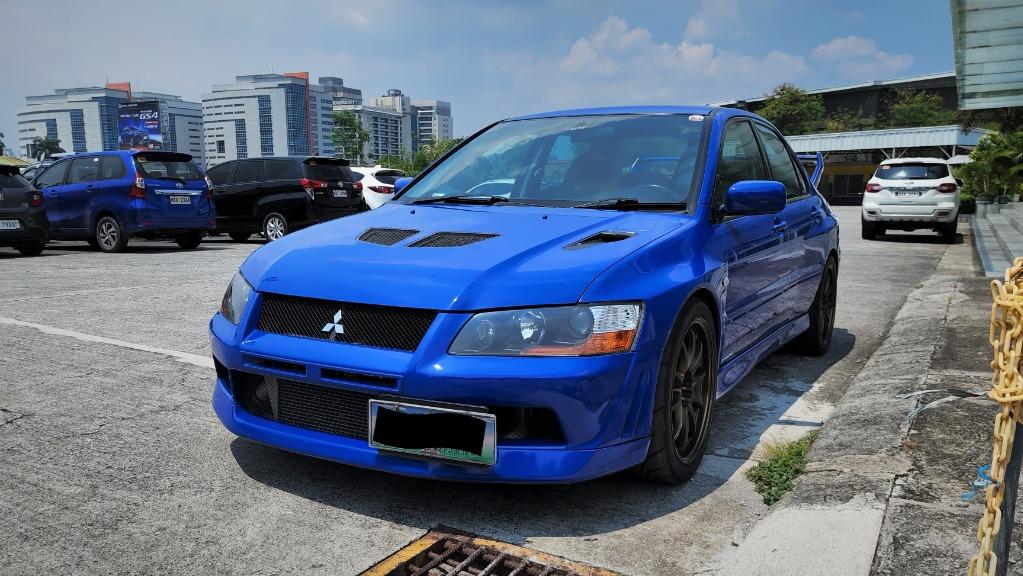Mitsubishi Lancer Evolution VII GSR (M) (Category: Used Cars) located in Pasig City. Submitted by elmcarstrading (Listing ID 1165782816, Image 1). Description: 2002 Mitsubishi Lancer Evolution 7 (JDM) ✅ CT9A chassis number and Lancer Evolution indicated in Registration ✅ Origjnal Paint ✅ 5 Speed Manual Transmission ✅ Quick Steer ✅ HKS BOV ✅ HKS Boost Controller ✅ HKS mushroom cold air Intake ✅ Apexi Turbo Timer ✅ Defi Gauges ✅ Volk Rays CE28 (Ori