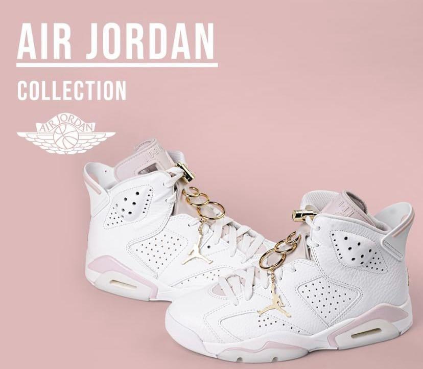 white and pink jordans 6