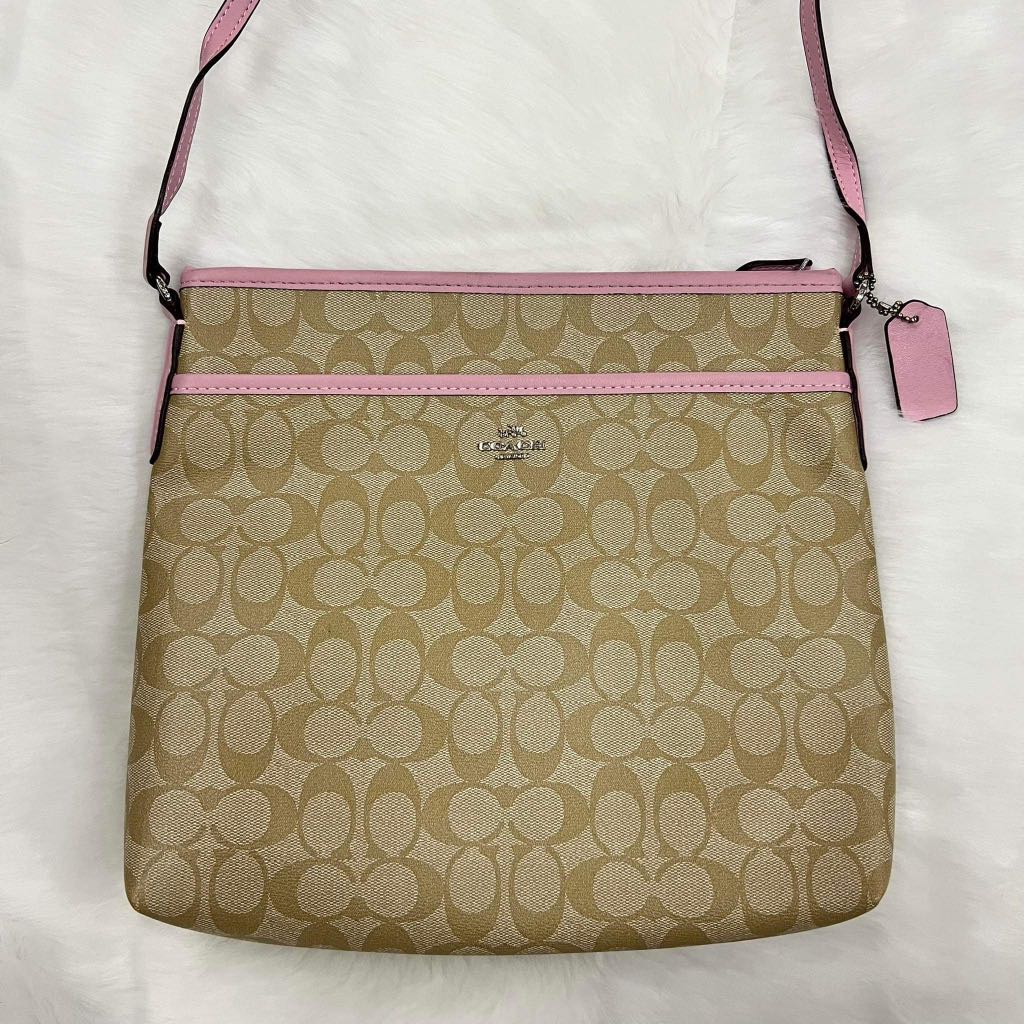 Coach sling bag pink price clearance