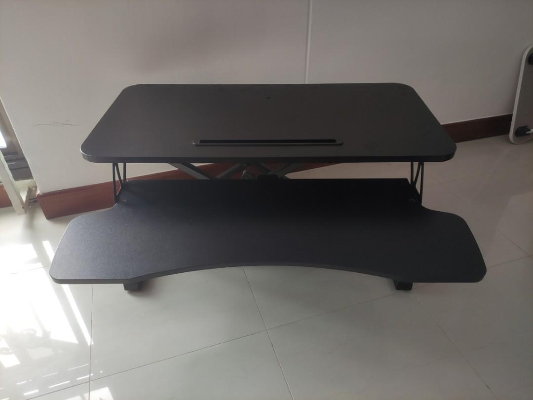 Extendable Computer Table (Category: Tables & Sets) located in Singapore. Submitted by omelettefart (Listing ID 1165848501, Image 1). Description: Tried it for a day, so as good as new. Still have the box and all the original things inside. 1. Can be put on top of tables. 2. Can extend the height of the table to match your needs..