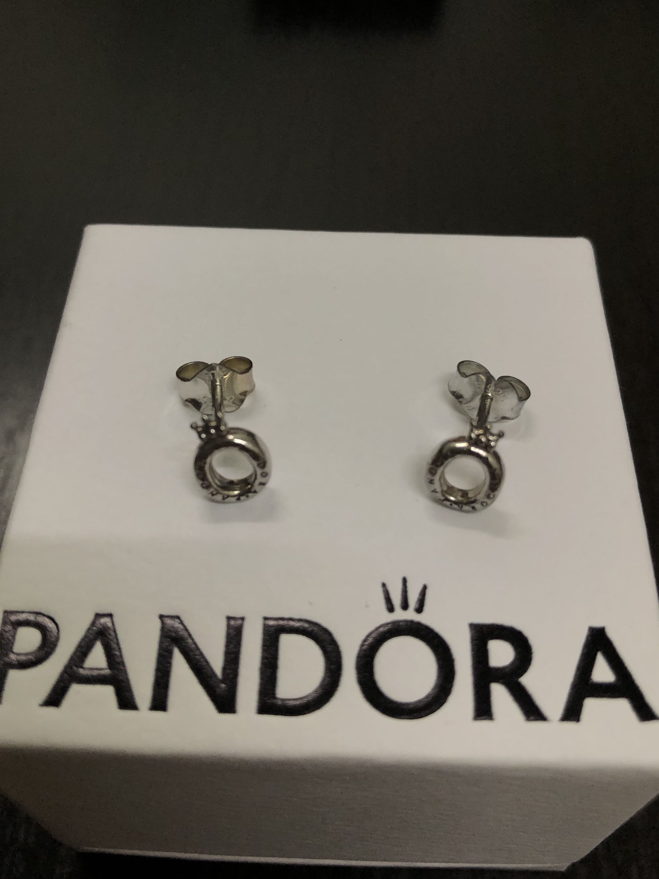 Polished crown o stud earrings store