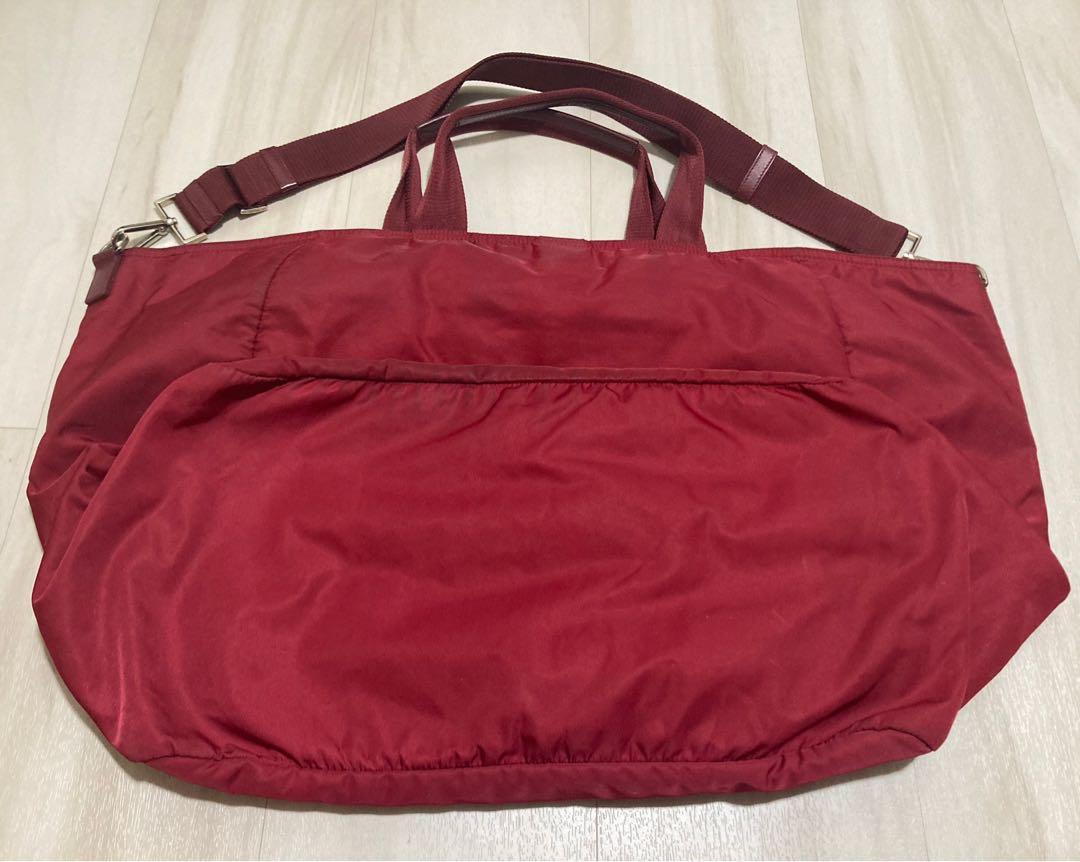 Prada (Category: Shoulder Bags) located in Singapore. Submitted by declutter122 (Listing ID 1165947048, Image 3). Description: Selling authentic Prada Nylon Bags which I have kept for years! 1) Red colour (BR4055 Vela Cerise) - inner lining of the bag is torn and it’s about 9.5inches - maximum width of bag is about 24.5 inches and length 15 inches - really pretty and chic color and you can send to bag spa to stitch inner lining/ clean the bag - s