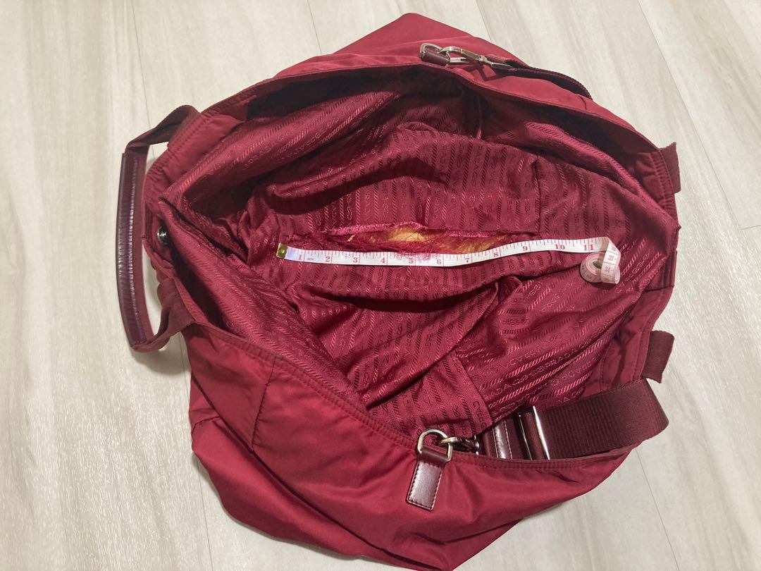 Prada (Category: Shoulder Bags) located in Singapore. Submitted by declutter122 (Listing ID 1165947048, Image 6). Description: Selling authentic Prada Nylon Bags which I have kept for years! 1) Red colour (BR4055 Vela Cerise) - inner lining of the bag is torn and it’s about 9.5inches - maximum width of bag is about 24.5 inches and length 15 inches - really pretty and chic color and you can send to bag spa to stitch inner lining/ clean the bag - s