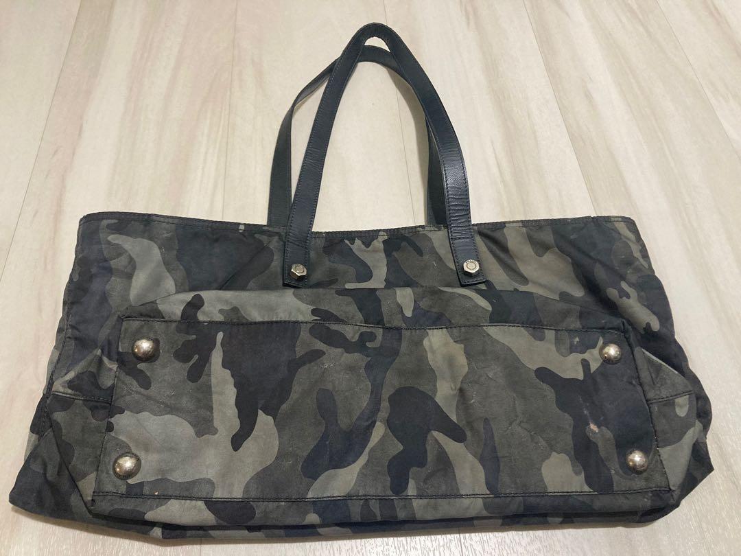 Prada (Category: Shoulder Bags) located in Singapore. Submitted by declutter122 (Listing ID 1165947048, Image 7). Description: Selling authentic Prada Nylon Bags which I have kept for years! 1) Red colour (BR4055 Vela Cerise) - inner lining of the bag is torn and it’s about 9.5inches - maximum width of bag is about 24.5 inches and length 15 inches - really pretty and chic color and you can send to bag spa to stitch inner lining/ clean the bag - s