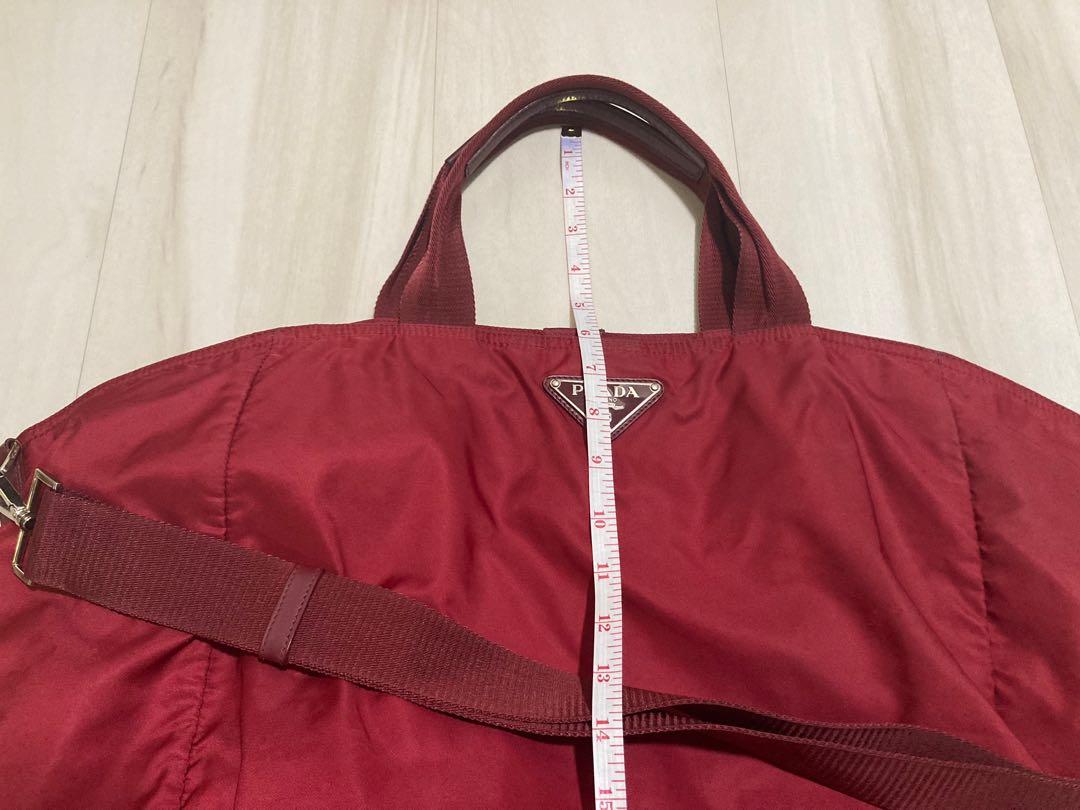 Prada (Category: Shoulder Bags) located in Singapore. Submitted by declutter122 (Listing ID 1165947048, Image 5). Description: Selling authentic Prada Nylon Bags which I have kept for years! 1) Red colour (BR4055 Vela Cerise) - inner lining of the bag is torn and it’s about 9.5inches - maximum width of bag is about 24.5 inches and length 15 inches - really pretty and chic color and you can send to bag spa to stitch inner lining/ clean the bag - s