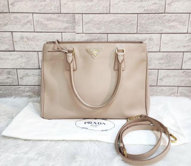 Prada Beige Saffiano (Category: Luxury Bags & Wallets) located in Santa Ana. Submitted by astonandariana (Listing ID 1165826859, Image 1). Description: With dustbag Minor scuffings.