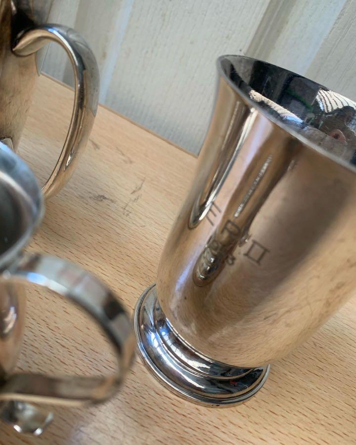Assorted Vintage Tankards set (Category: Coffee & Tea Tableware) located in Pasig City. Submitted by colawire (Listing ID 1166030817, Image 3). Description: Tankards Left- Der by Golf Club 3rd division Bogey May 1965 L.A. Ward Php280 Center Silver plated Made in England Php140 Right Chester Silver plate ERO 1953 Made in England Php380 Take all- 590.