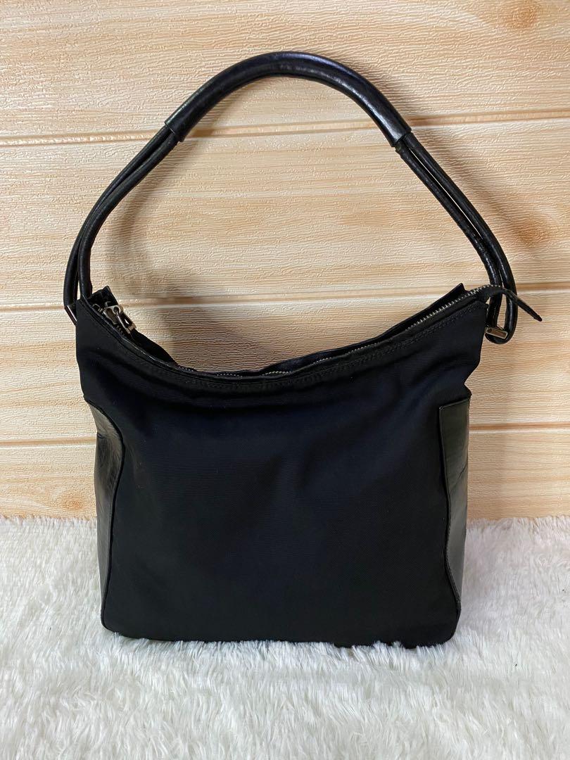 Authentic Gucci Tote Bag (Category: Luxury Bags & Wallets) located in Cagayan de Oro. Submitted by riggstuffs (Listing ID 1166118779, Image 2). Description: Guaranteed Authentic Gucci Tote Bag (small) Nylon material with leather trimming The Exterior and interior are clean No other inclusion DISCLAIMER: Riggstuffs is not affiliated or associated with any brand posted. All copyrights are reserved for the original brand owners. All items are Pre-lo
