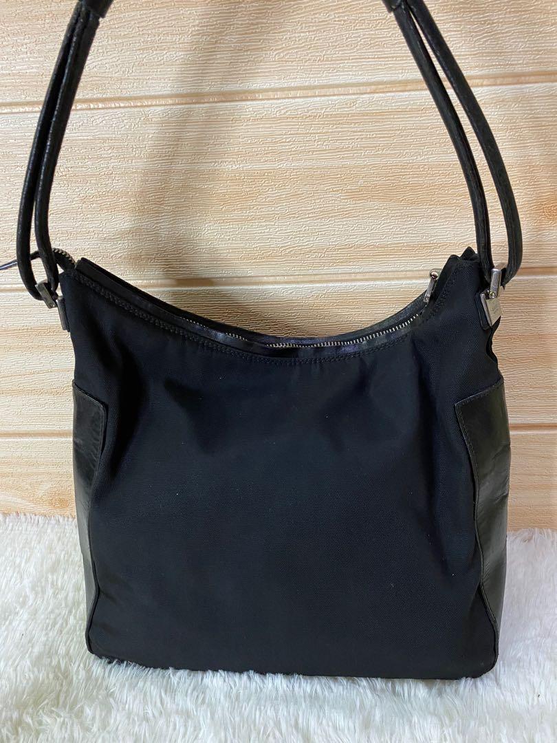 Authentic Gucci Tote Bag (Category: Luxury Bags & Wallets) located in Cagayan de Oro. Submitted by riggstuffs (Listing ID 1166118779, Image 1). Description: Guaranteed Authentic Gucci Tote Bag (small) Nylon material with leather trimming The Exterior and interior are clean No other inclusion DISCLAIMER: Riggstuffs is not affiliated or associated with any brand posted. All copyrights are reserved for the original brand owners. All items are Pre-lo