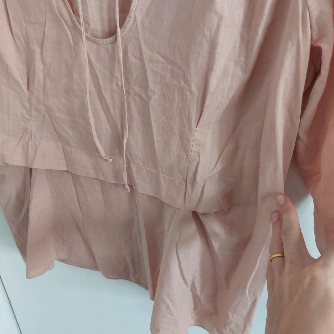Marni Light Pink Blouse (Category: Blouses) located in Angeles City. Submitted by greensstuff (Listing ID 1166024325, Image 3). Description: B: 35" Has some writing on the hem of the sleeve as seen in the 4th photo. It's been washed but I just noticed the writing but in otherwise good condition. Fabric is very lightweight. I bought through an IG shop for 700 pesos. DM for more info #4theplanet.