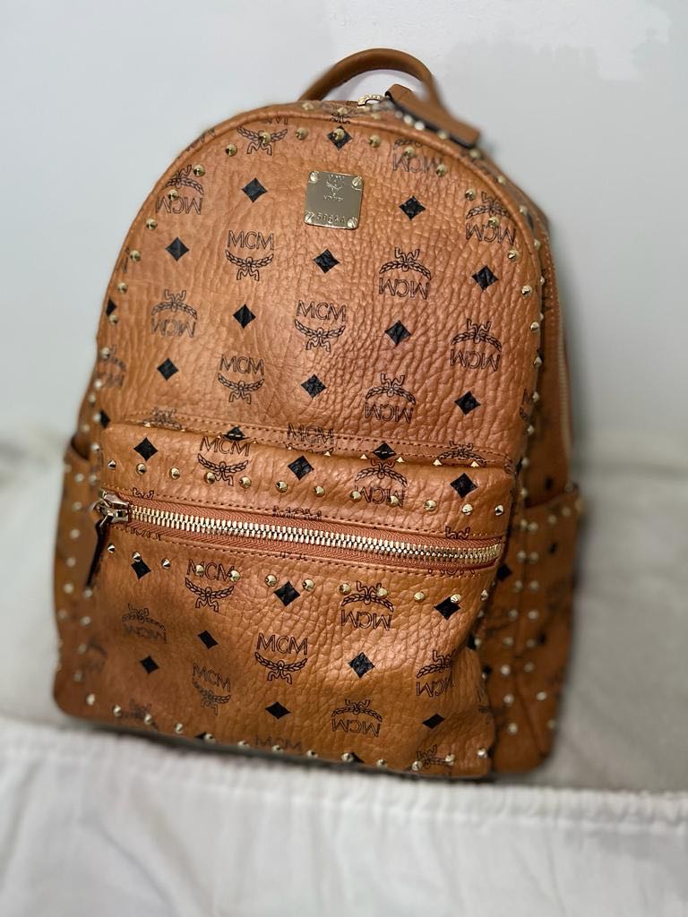 MCM Star Backpack, Luxury, Bags & Wallets on Carousell