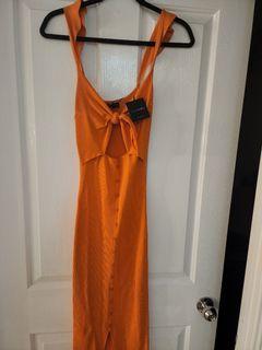 Orange flouro dress.