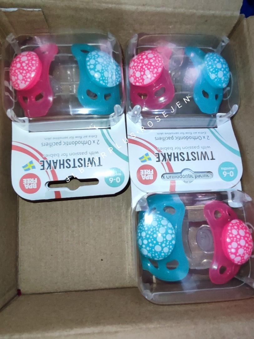 Twist shake pacifier (Category: Soothers & Pacifiers) located in Caloocan City. Submitted by jen_prelovedcorner.2 (Listing ID 1166147040, Image 3). Description: Twist shake pacifier 2pcs per set, 150 each set Purple and pink: 6months + Pink and blue green: 0-6 months Mall price: 530.