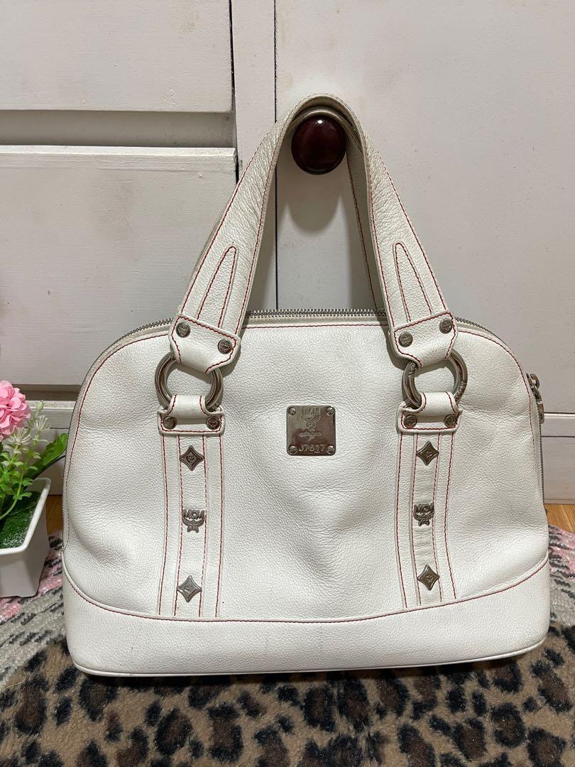 Authentic MCM White Alma Medium Bag Rare Color (Category: Luxury Bags & Wallets) located in Cavite. Submitted by jdbprelovedbagsph (Listing ID 1166407824, Image 1). Description: Authentic MCM White Alma Medium Bag In good condition No major flaws With signs of usage Sa Handle medjo madumi napo kase white sya. And meron din pen marks sa loob ng bag Please check photos po. Pwede po ipa bag spa kung maselan. Ykk Zip With etiketa Naiikot ang turnilyo