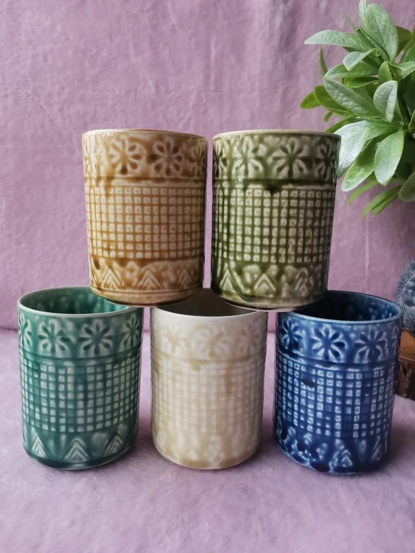Colored Cups Set (Category: Coffee & Tea Tableware) located in Talisay. Submitted by enavnai13 (Listing ID 1166409624, Image 1). Description: Colored Cups Set 5 pcs Some with glaze crazings Please swipe to see item measurements 300 all + SF #CVTavailable #japansurplusph #stonewareph #stoneware #ceramics #mugs #cups #plates #japanstoneware #japanstoneware #japanceramic #japansurplus #coffeelovers #coffeelover.