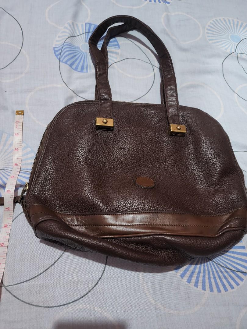Dooney and Bourke vintage (Category: Luxury Bags & Wallets) located in Cebu City. Submitted by rhea20ph (Listing ID 1166385389, Image 2). Description: pre loved item vintage alma style genuine leather riri zipper hand bag only minimal signs of use plus sf.