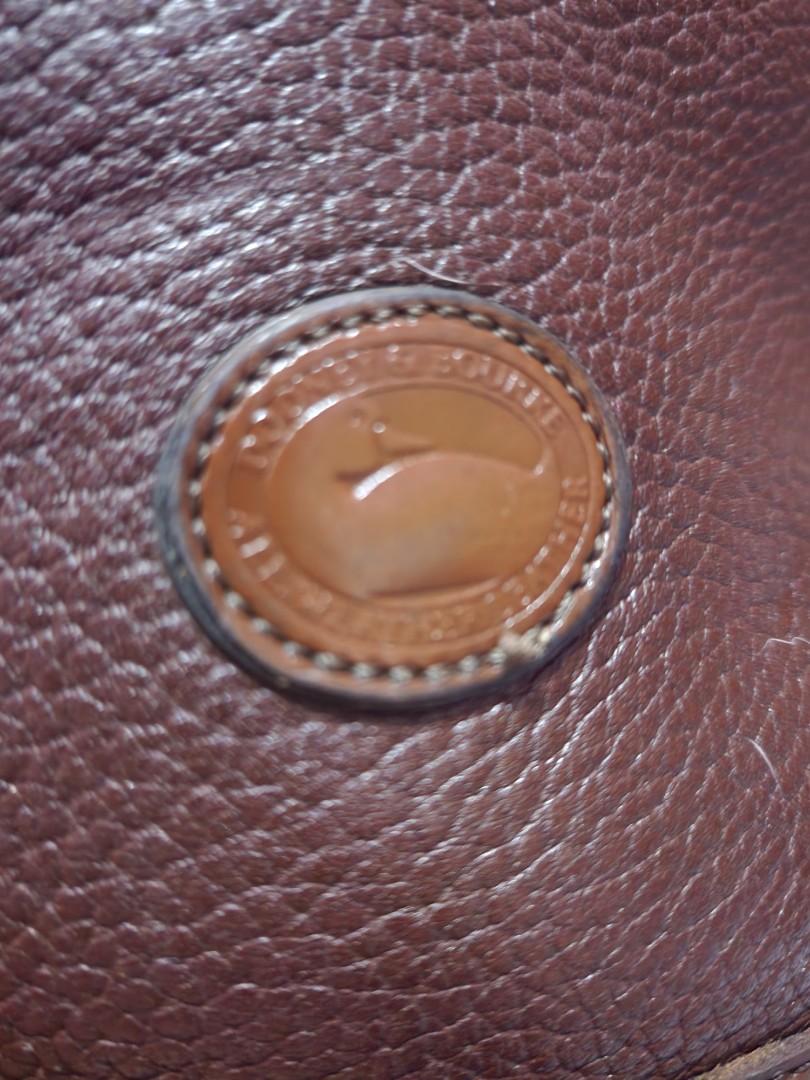 Dooney and Bourke vintage (Category: Luxury Bags & Wallets) located in Cebu City. Submitted by rhea20ph (Listing ID 1166385389, Image 3). Description: pre loved item vintage alma style genuine leather riri zipper hand bag only minimal signs of use plus sf.