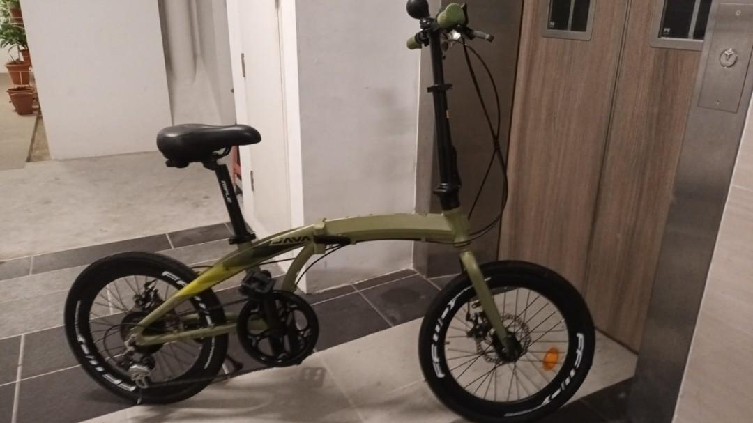 JAVA BICYCLE (Category: Bicycles) located in Singapore. Submitted by hiacelock (Listing ID 1166371085, Image 4). Description: Selling a Well Used bicycle. RFS not cycling anymore. Abit scratch on the upper line frame. Rear tyre need to be change. 20 inch wheel. Other than that no problem. What u see is what u get. Not for Fussy Buyer. No Nego, Fixed price. Can go shop & buy if want New Bicycle. Thanks.