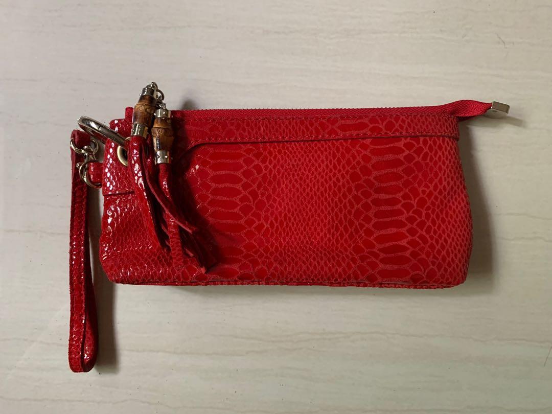 Red new arrivals wristlet clutch
