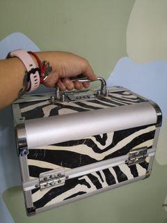 Traveling case for jewelry or make up with lock