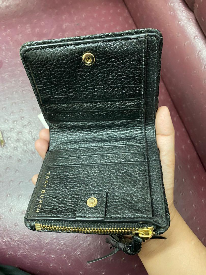 AUTHENTIC tory burch bi fold wallet (Category: Luxury Bags & Wallets) located in Santa Rosa. Submitted by authenthei (Listing ID 1166474213, Image 2). Description: AUTHENTIC TORY BURCH WALLET 8/10 condition Flaws: sign of usage and noticeable fold in keychain (pompom) Inclusions: price tag and authenticity card MOP: gcash and bank transfer only No cod no cop No haggling SF on buyer.